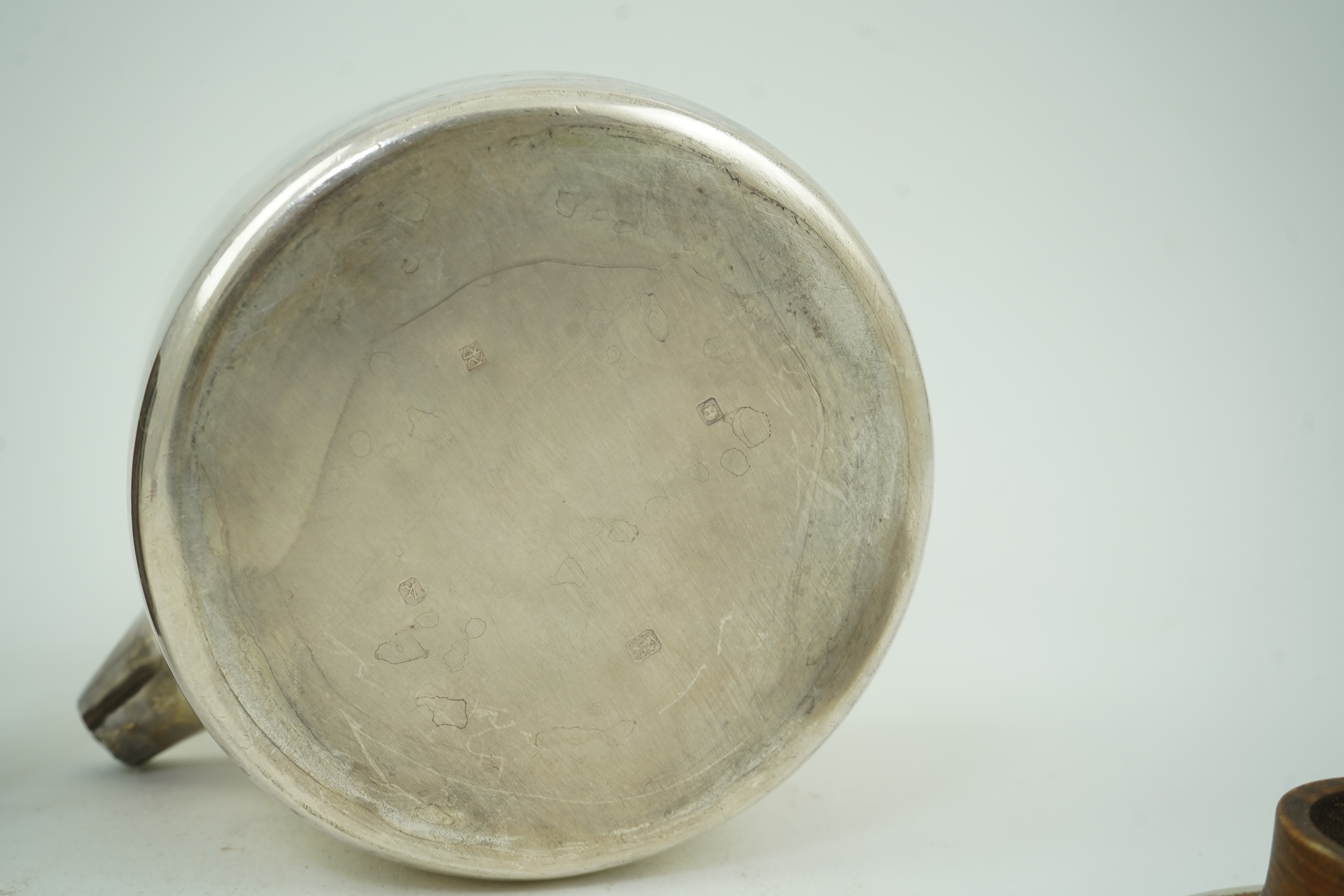 Roy Ridsdale (1942-2020): A silver tea kettle and matching cream jug